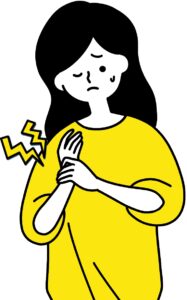 手首が痛む女性
