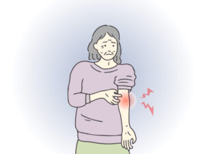 肘が痛む女性