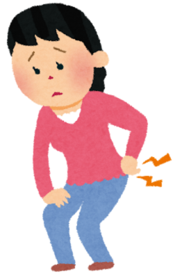 腰を痛めている女性